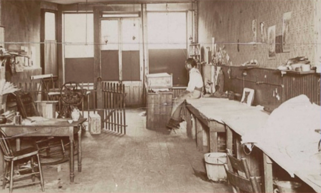 Man sitting in early laundry