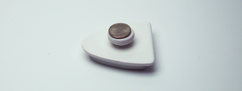 Teapot lid with dime sitting on top